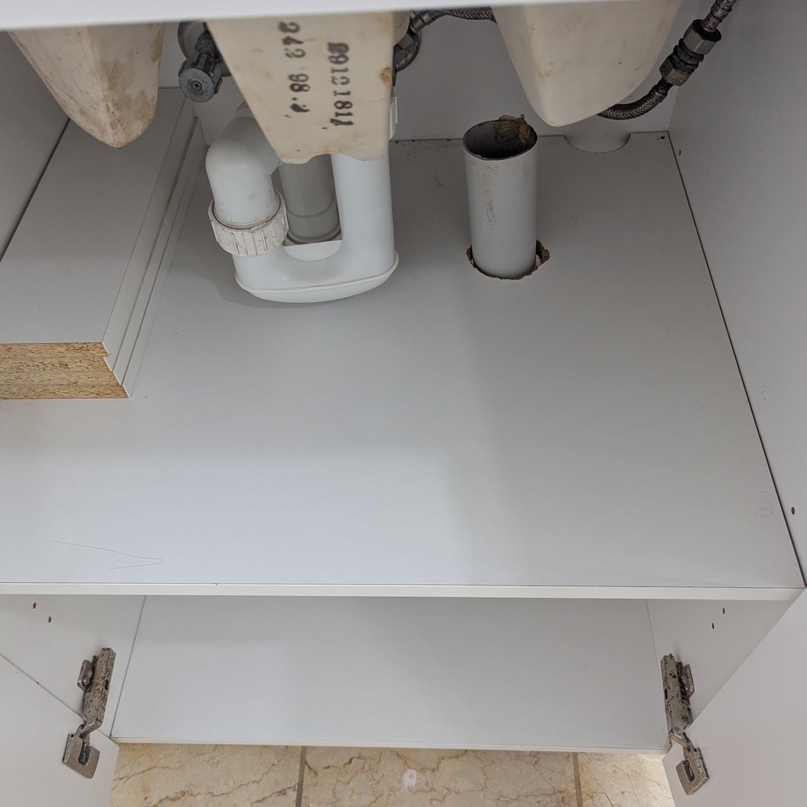 Under-sink cabinet cleaned