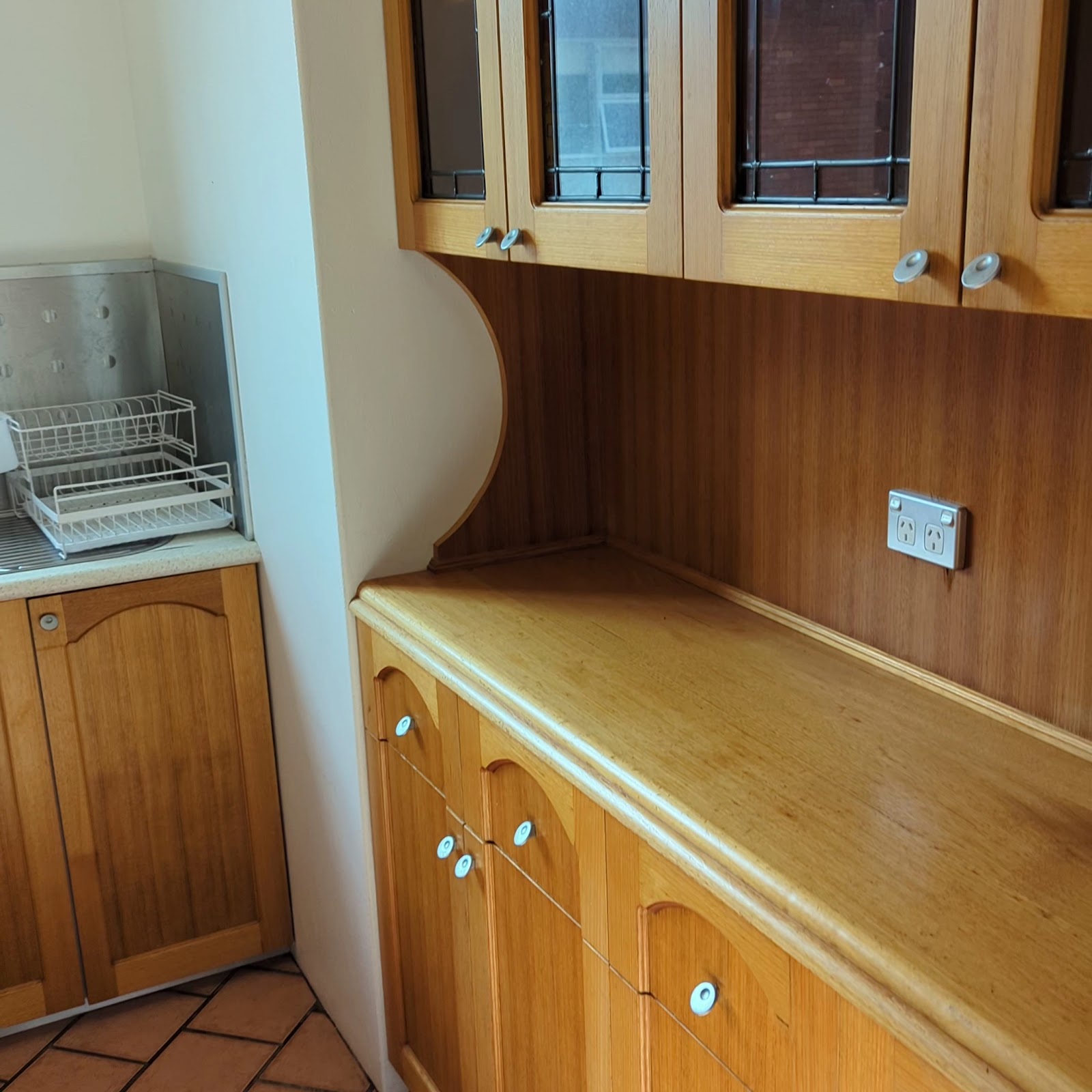 Kitchen cabinetry and dish rack