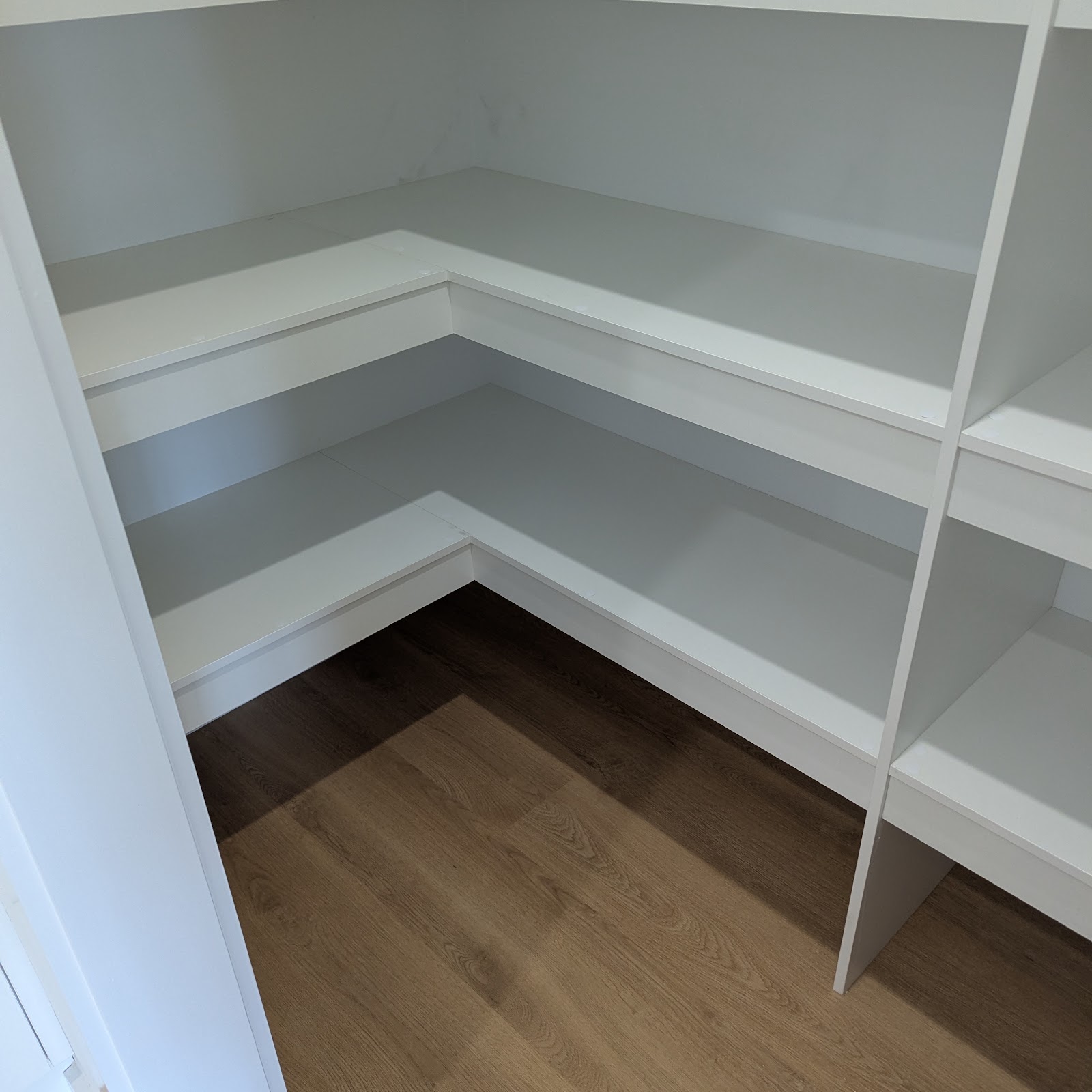 Walk-in pantry shelving after clean